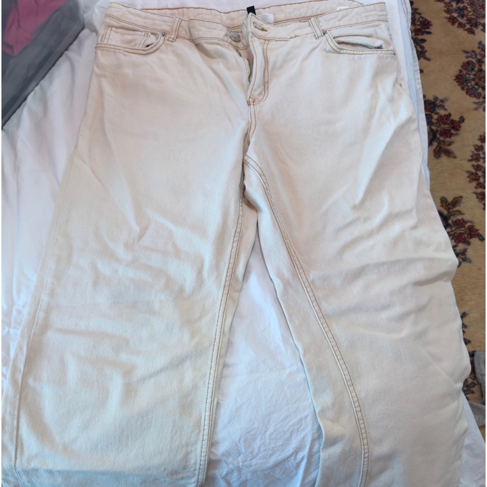 H&M - cream colored, wide leg jeans, very flattering, 2 pair available.